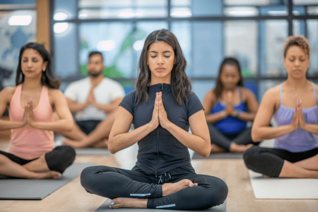 Traditional hot yoga class in a heated and humid room